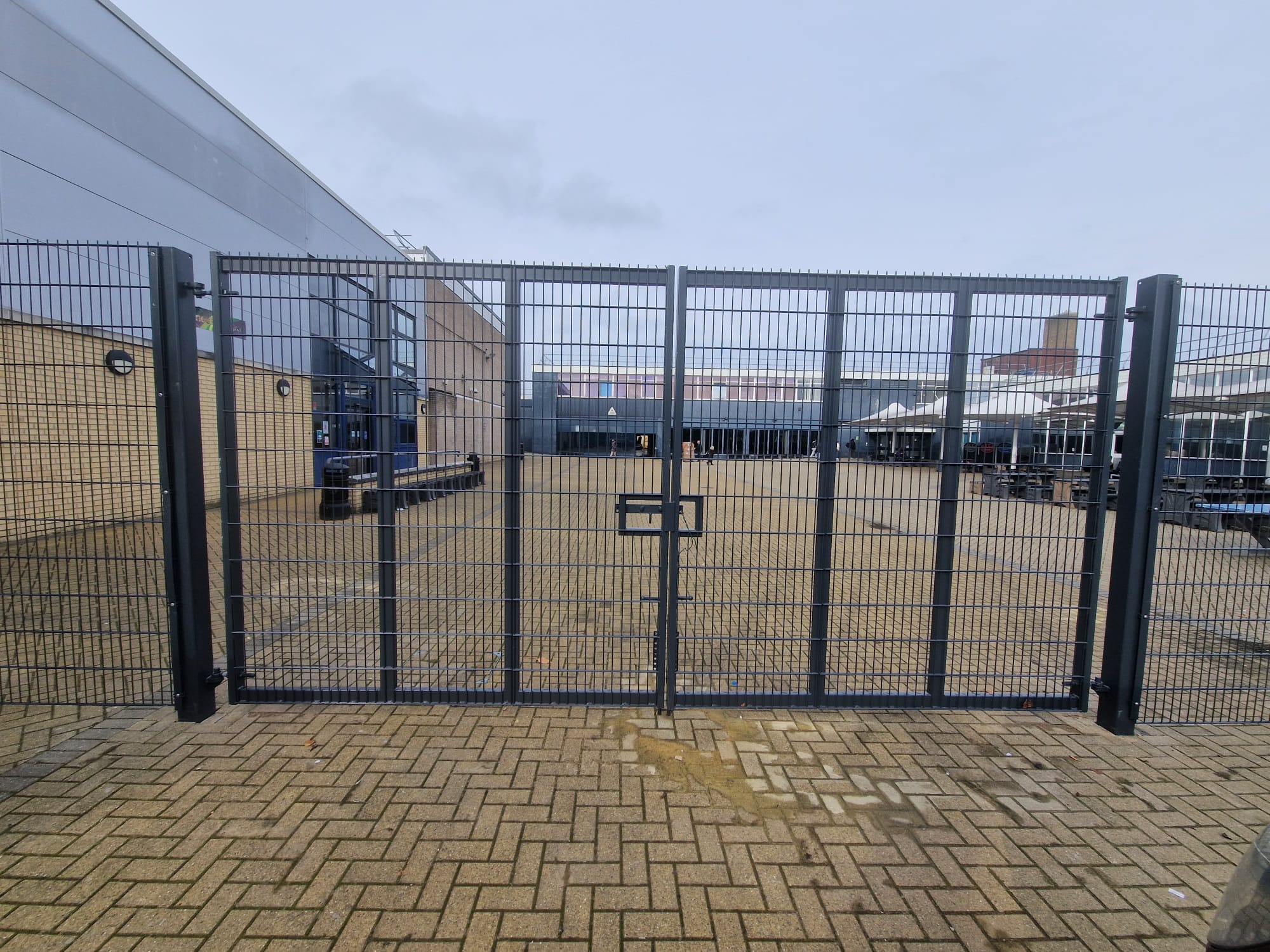 Mesh swing gate installed by Pro Fencing Ltd