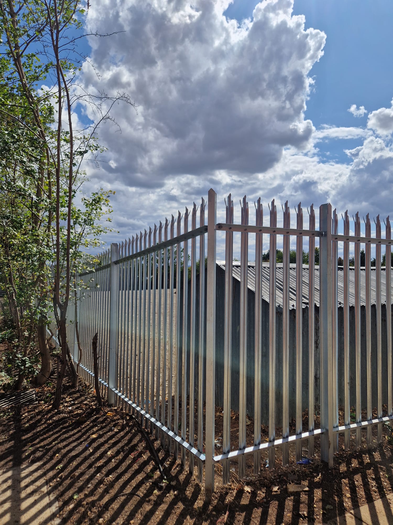 Galvanised palisade fencing following the Clearview site boundary