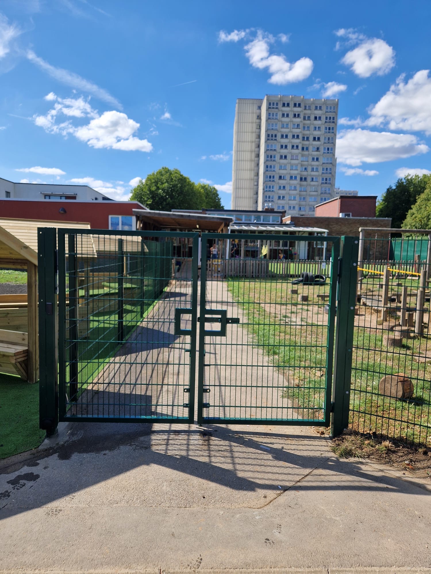 Completed green double-leaf mesh swing gate at St Helen's Catholic School