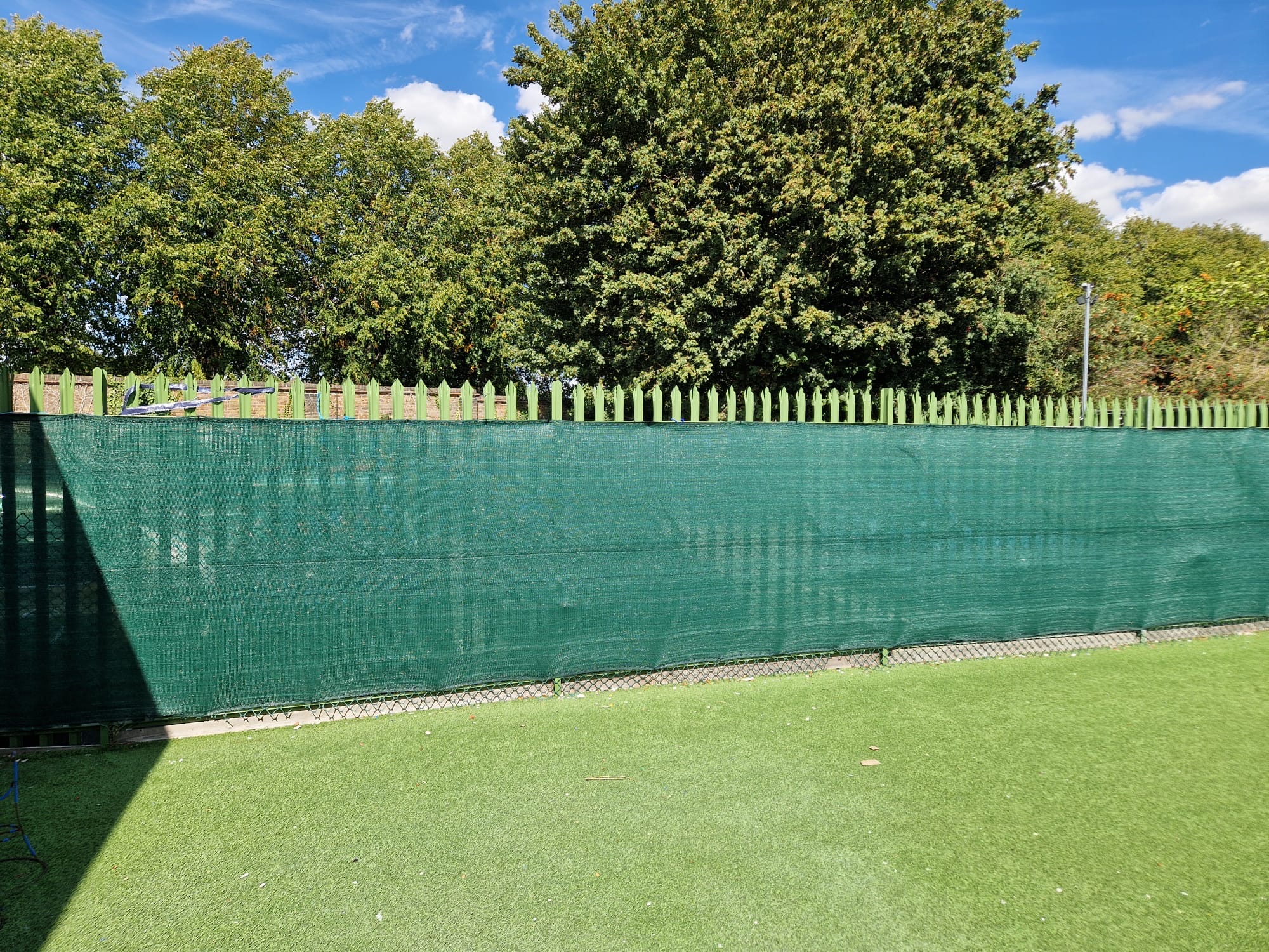 Privacy netting fitted to the second play area boundary